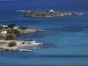 View of island and coves from Mycenaean Acropolis, Paros